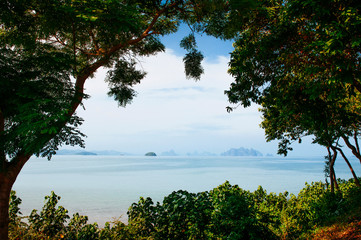 Wide Phuket vibrant turqoise blue sea with many islands in far distance background