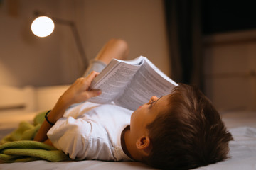 Reading book before sleeping time © cherryandbees
