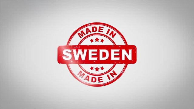 Made In SWEDEN Signed Stamping Text Wooden Stamp Animation. Red Ink on Clean White Paper Surface Background with Green matte Background Included.