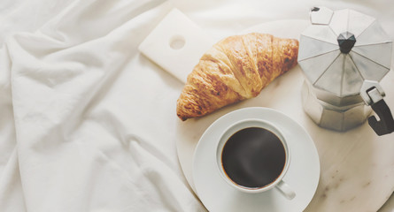 Tasty classic breakfast served in bed