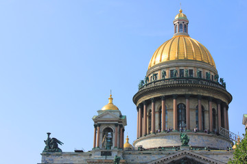 Fototapeta na wymiar Saint Isaac's Cathedral in St. Petersburg, Russia. Detailed Close Up View of Orthodox Basilica and Museum Building, Monumental European Architecture. Exterior Elements of City Landmark on Empty Sky