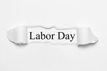 Labor Day on white torn paper