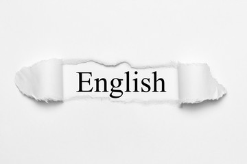English on white torn paper