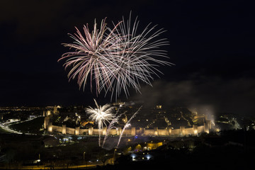night views of fireworks in the city of Avila in Spain, medieval walled city perfectly preserved
