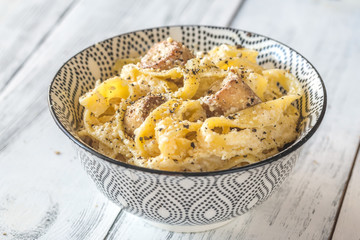 Bowl Alfredo pasta with mushrooms