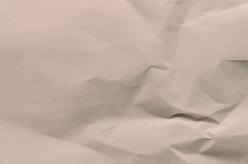 Old and vintage background by crumpled paper texture and free space for text.