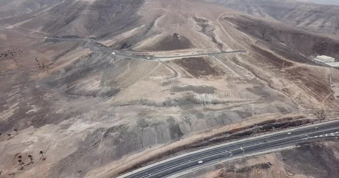 Aerial view of FV-2 motorway and mountain in Fuerteventura, Canary Islands, Spain