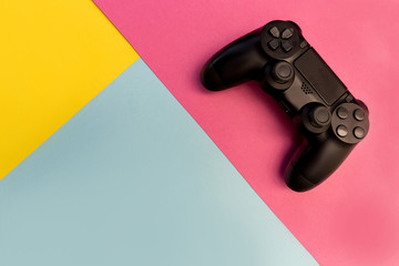 Video games gaming controller isolated on pink background
