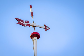 Danish weather vane with the flag of Denmark