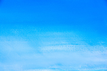 Details of acrylic paintings showing colour, textures and techniques.  Full frame graduated blue sky background.