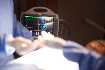 Heart monitor measuring vital signs. heart rate monitor in hospital theater