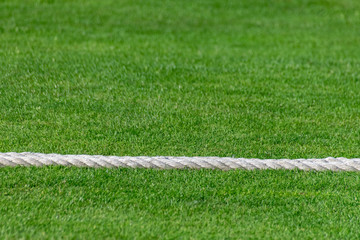 Rope marking the boundary of a rural village cricket pitch