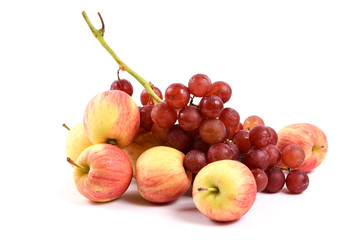 fresh apple and grape on white
