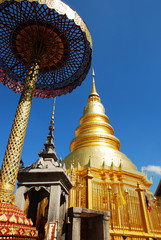 Traditional Golden Temple in Northern Thailand sky background