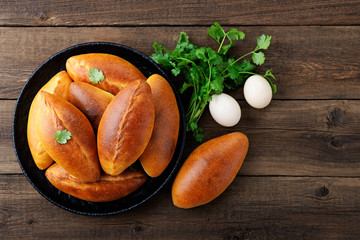 Fresh patties with egg and green onion stuffing. top view