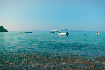 Afytos beach in Greece, rocks and blue sea
