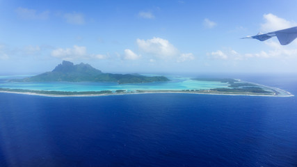 Flying Over Bora Bora's Blue Lagoon In French Polynesia