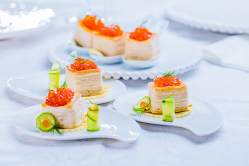 Tartlets with red caviar