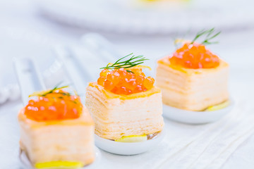 Tartlets with red caviar