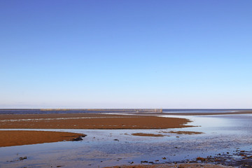 Yagry in Severodvinsk. White sea coast. sea tide