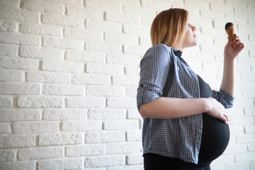 Pregnant young beautiful girl on the ninth month 