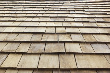 Close up of brown wood roof shingles.Wood background.