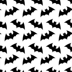 Naklejka na ściany i meble Halloween flying bat. Halloween vector seamless pattern wallpaper background. silhouette of bats. Seamless pattern. Halloween background.