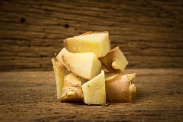 ginger piece cube on wood