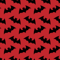 Halloween flying bat. Halloween vector red seamless pattern wallpaper background. silhouette of bats. Seamless pattern. Halloween background.