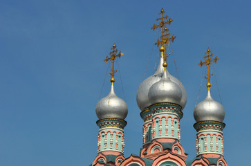 Fototapeta na wymiar Domes with crosses of the Orthodox church