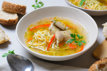 Quail Noodle Soup, Homemade Broth with Noodles and Vegetables Served with Bread Rolls, Zama, Traditional Moldavian and Romanian Soup