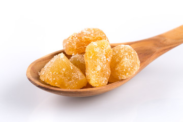 heap of sweat Candied ginger isolated on white