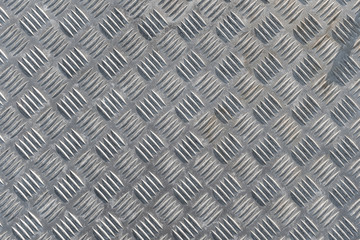 Metal floor plate with diamond pattern texture