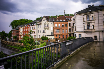 Naklejka premium old stone buildings in the rain