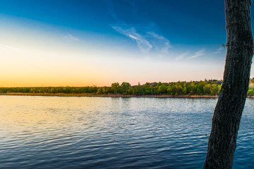 Very beautiful and colorful night and evening landscapes over the river Seversky Donets in the Rostov region. A rich moonlit sunset like a sunset, a hot hue with bright colors of nature