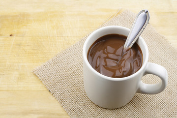 Hot chocolate on a wooden table