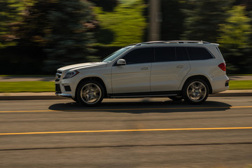 Speeding silver SUV