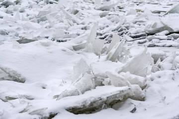 Fototapeta na wymiar Ice hummock on Frozen Neva River in Saint Petersburg. Russia