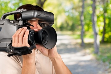 Cameraman working with camera   isolated