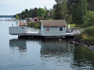 Fototapeta na wymiar Cabin and boathouse in the Stockholm Archipelago, Sweden