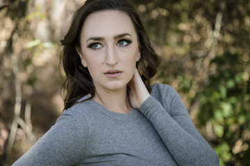 portrait of young woman in park