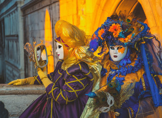Colorful carnival masks at a traditional festival in Venice, Italy