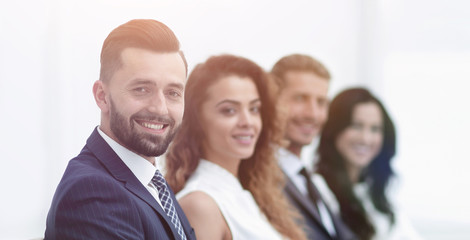 Obraz premium group of business people sitting at the desktop