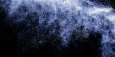 A stream of water and a cloud of drops