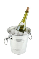 A bottle of wine in an ice bucket. Isolated