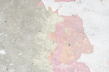 Old wall of green and pink color with cracked paint. Great retro background