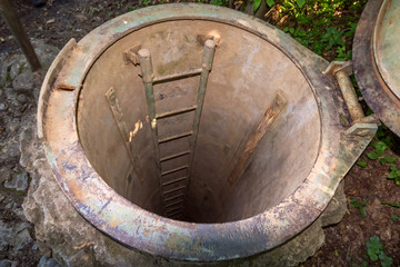 open hatch with ladder into down