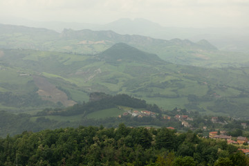 Fog over village at hills