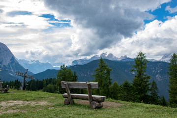 Rustic wood bench at 1500 m above sea level in Auronzo di Cadore italy 