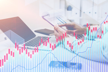 Businessman hand checking data, office and graph